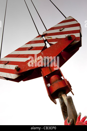 Building site crane hook and cable pulleys Stock Photo