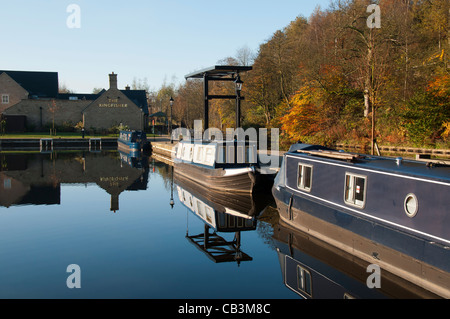 An autumn scene at Frenches Marina on the Huddersfield Narrow canal at Greenfield, Saddleworth, Greater Manchester, UK. Stock Photo