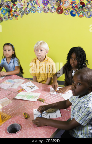 Children drawing and paying attention in art class Stock Photo - Alamy