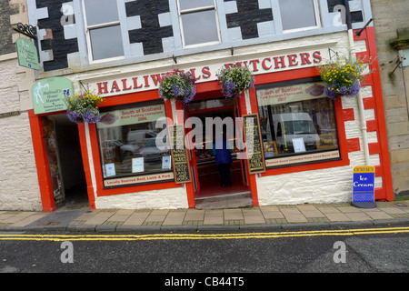 A tilted camera view of a butcher shop on a hill in the town of Selkirk Scottish borders Stock Photo