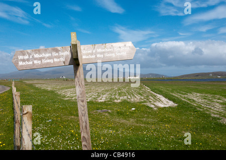 A direction sign for the Machair Way long distance footpath on South Uist in the Outer Hebrides, Scotland Stock Photo