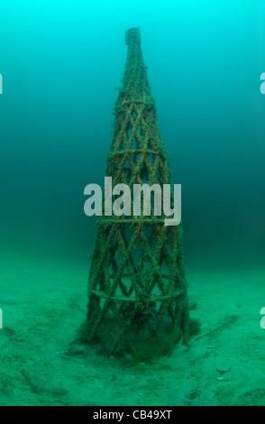 sculpture Shukhov radio tower (Shabolovka tower) to first in the world underwater museum Leaders' Alley or Soviet Atlantis Stock Photo