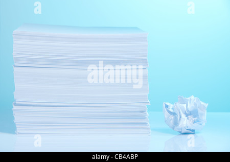 Pile of paper and small crumpled paper sheet Stock Photo