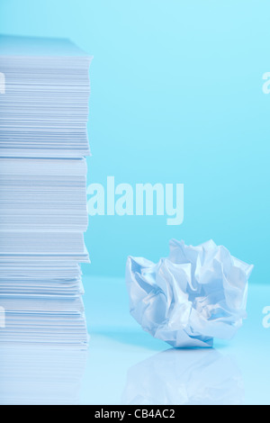 Pile of paper and small crumpled paper sheet Stock Photo