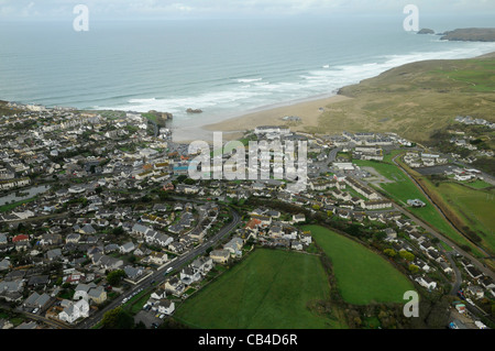 The small town of Perranporth sits behind the cliffs at the south end of Perran Sands beach on the north coast of Cornwall Stock Photo