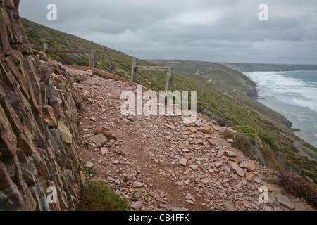 Rocky path along the cliffs at Chapel Porth, on a stormy day. Stock Photo