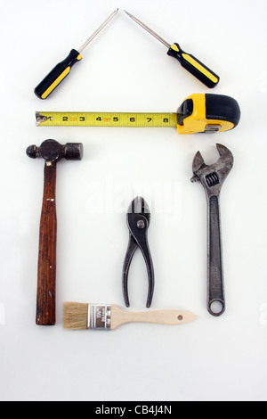 A house shaped symbol made up of tools Stock Photo
