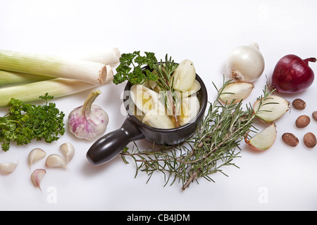 Preparation and ingredients for a fresh leek and onion soup  Stock Photo