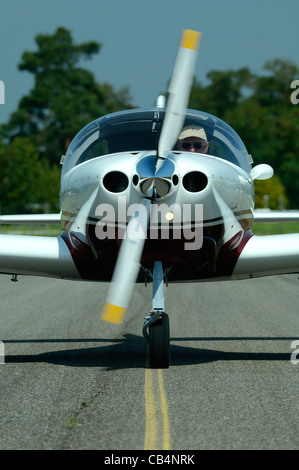 Front view off small sport European LSA Aerospool Dynamic Turbo plane taxing on runway Stock Photo