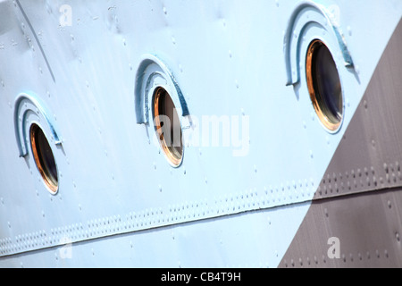 Ship window steel blue background outdoor colour Stock Photo