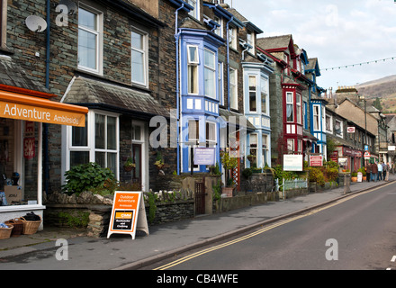 Street scene showing Adventure shop and bed and breakfast accommodation in Compston Road Ambleside The lake District Cumbria UK Stock Photo