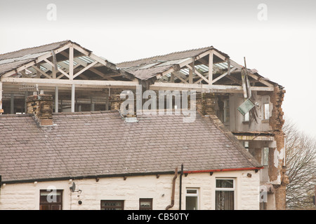 An old cotton mill building being demolished in Burnley, Lancashire, UK. Stock Photo