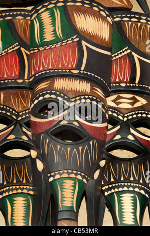 Africa, Mozambique. Capital city of Maputo. Local souvenir carved handicraft masks. Stock Photo