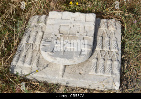 A coat of arms engraved on a stone in the grounds of the Castle of the Knights, Kos Town, Kos Island, Dodecanese, Greece Stock Photo
