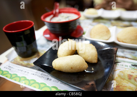 deep fried dumplings at one dim sum tim ho wan michelin starred restaurant in mong kok district kowloon hong kong hksar china Stock Photo