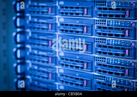 Server rack cluster in a data center (shallow DOF; color toned image) Stock Photo