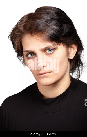Portrait of an angry young woman looking at camera. Stock Photo