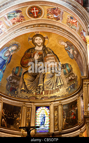 Christ in Majesty, flanked by the Blessed Virgin and St. John the Evangelist. Mosaic in the apse of Pisa Duomo, Tuscany, Italy Stock Photo