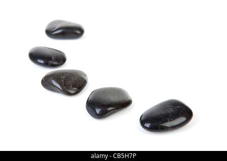 Black stepping stones in a row over white background Stock Photo