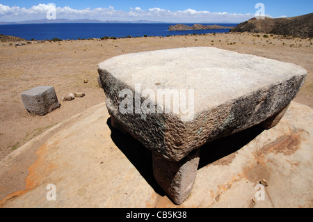 A stone table used for human sacrifice on Isla del Sol in Lake Titicaca, Bolivia Stock Photo