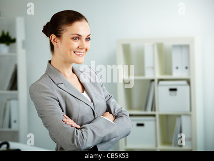 Portrait of smiling businesswoman in office Stock Photo