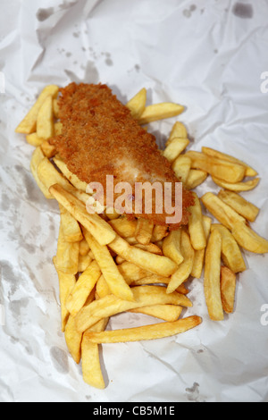 Bread crumbed fish and chips. Stock Photo