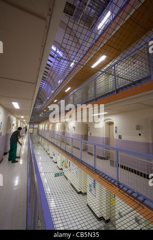 man cleaning the landings Wandsworth prison London UK Stock Photo