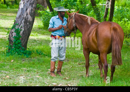 An unidentified man Participates in the annual festival 'Patria Gaucha' on March 5, 2011 in Tacuarembo, Uruguay. Stock Photo