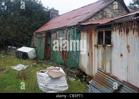 Ruined out-buildings behind church at Bunessan, Isle of Mull, Scotland. Stock Photo