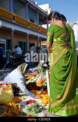 Flowers seller. Diu market. Union territories of Daman and Diu. India Stock Photo