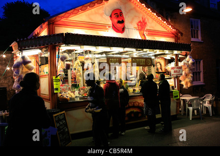 Hot Food on sale from an evening Street Market Stall in Sherborne Dorset Stock Photo