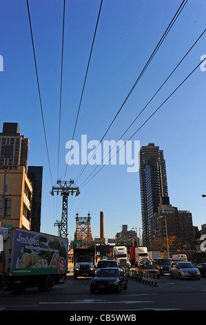 Traffic comes off the Queensborough Bridge into Manhattan New York NYC USA Stock Photo