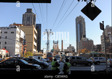 Traffic comes off the Queensborough Bridge into Manhattan New York NYC USA Stock Photo