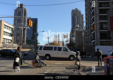 Traffic comes off the Queensborough Bridge into Manhattan New York NYC USA Stock Photo