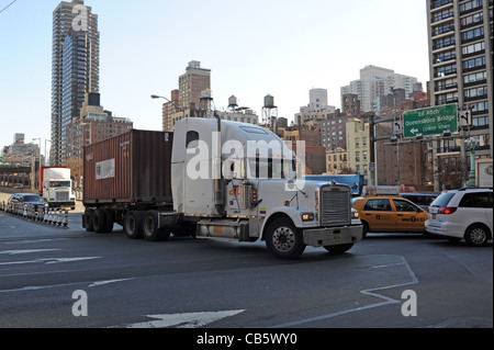 Traffic comes off the Queensborough Bridge into Manhattan New York NYC USA Stock Photo