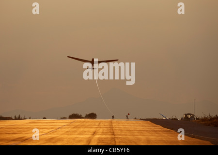 Alexander Schleicher ASK13 two seat training glider of the Crusaders Gliding club taking off on a winch launch from Kingsfield airstrip, Dhekelia, Cyp. Stock Photo