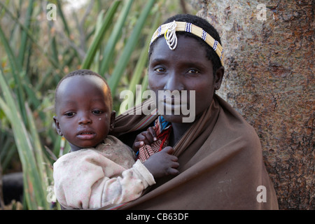 Hadza woman with her child, ethnic group living in the Lake Eyasi area, Tanzania Stock Photo