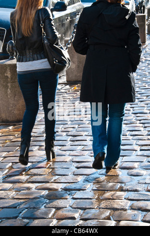 Two girls walking on the street, An Indian rural scene Stock Photo - Alamy
