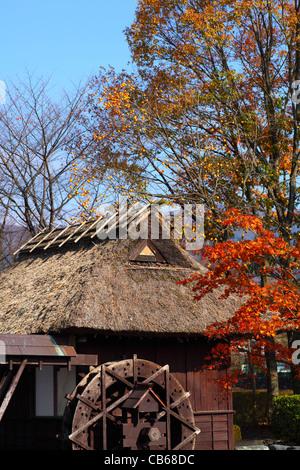 wheel mill in the country in autumn japan Stock Photo