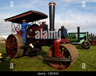 Old steam road roller being prepared for show. Stock Photo