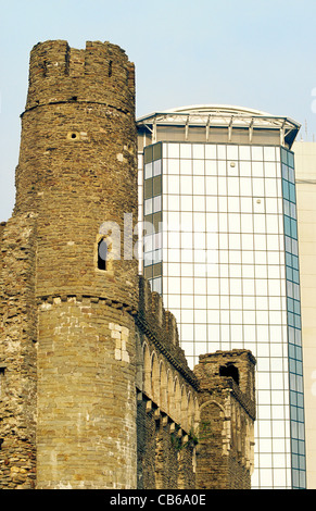 Modern BT British Telecom Building office block rises behind medieval Swansea Castle in Swansea city centre, south Wales Stock Photo