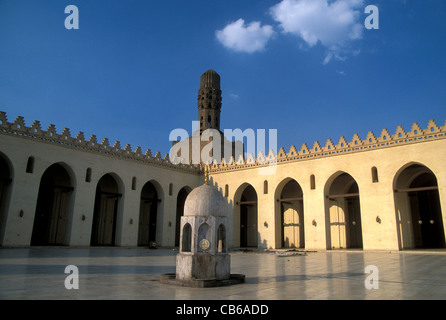 View of the courtyard, greatly restored, with ancient minaret, al Hakim Mosque, Cairo Stock Photo