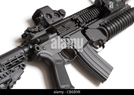 US Army assault carbine with grenade louncher close-up. Isolated on a white background. Weapon series. Stock Photo