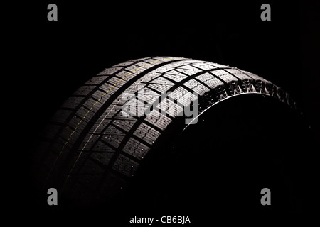 Brand new car tyre. Isolated on a white backgrond. Stock Photo