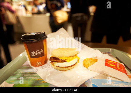 mcdonalds sausage and egg mcmuffin breakfast in restaurant store central district, hong kong island, hksar, china Stock Photo