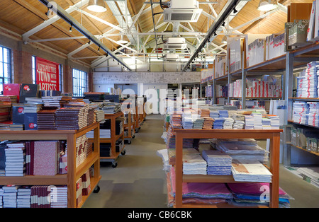 The inside of an artists shop, showing different types of paper, card, sketch books and sketch pads for sale. Cass Art. Stock Photo