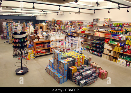 The inside of an artists shop, showing different types of paper, card, sketch books and art  products for sale. Cass Art. Stock Photo