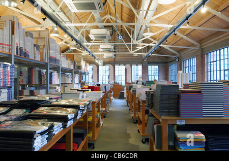 The inside of an artists shop, showing different types of paper, card, sketch books and sketch pads for sale. Cass Art. Stock Photo