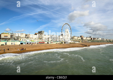 Ferries wheel in Brighton beach from the pier - England Stock Photo