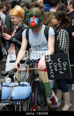 Protester with a monkey mask during the rally against the G20 in London - March 2009 Stock Photo